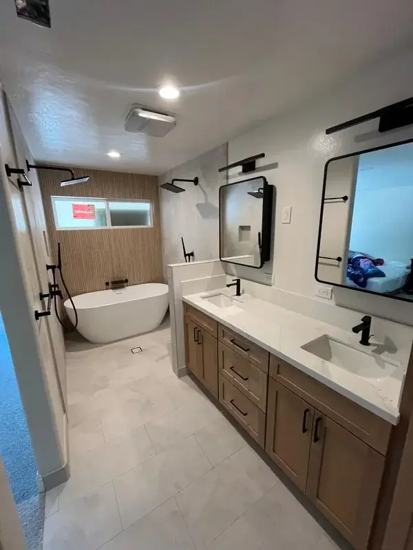 Master bath with freestanding soaking tub and walk-in shower